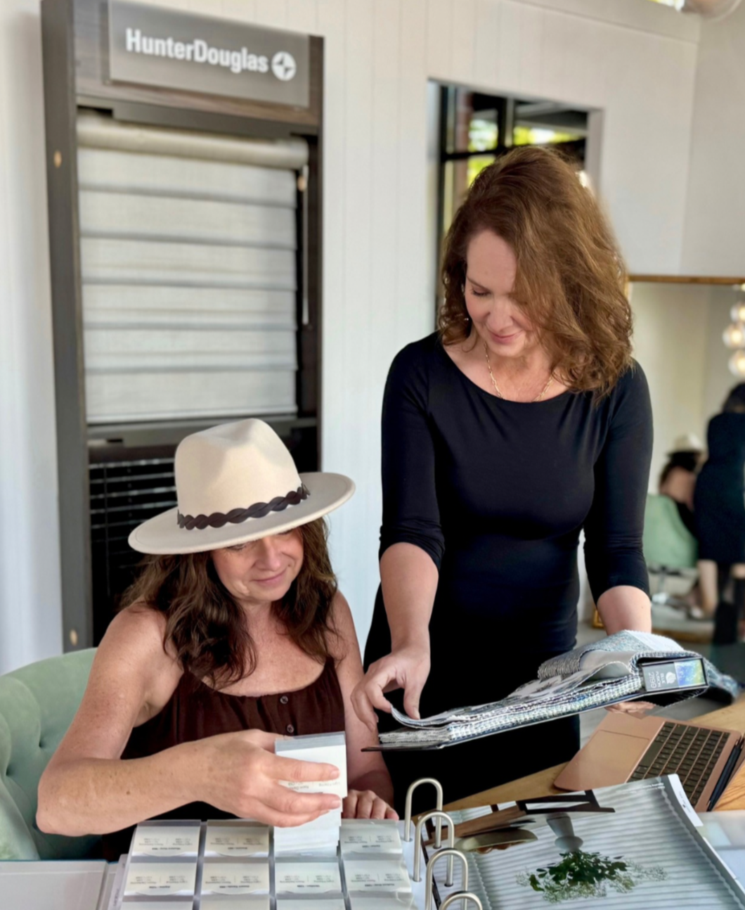 women selling blinds